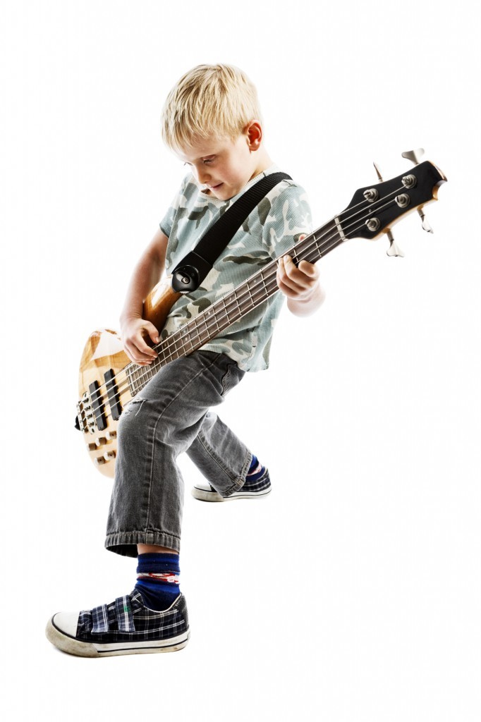 Kid playing the Bass - Music Makers Calgary